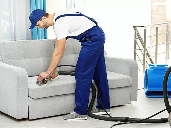 Chicago cleaning technician working on upholstered furniture